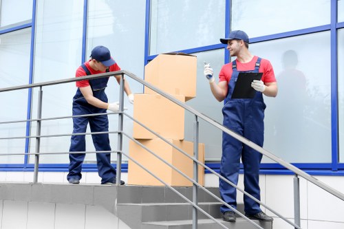 Staff member checking safety measures at a storage facility entrance