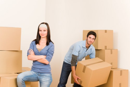Removal van and movers preparing for a Tufnellpark home move