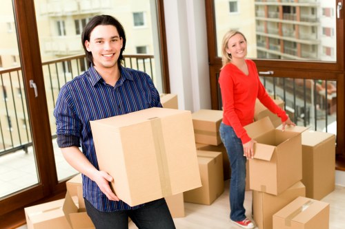 Careful furniture loading for small removals in a North London street